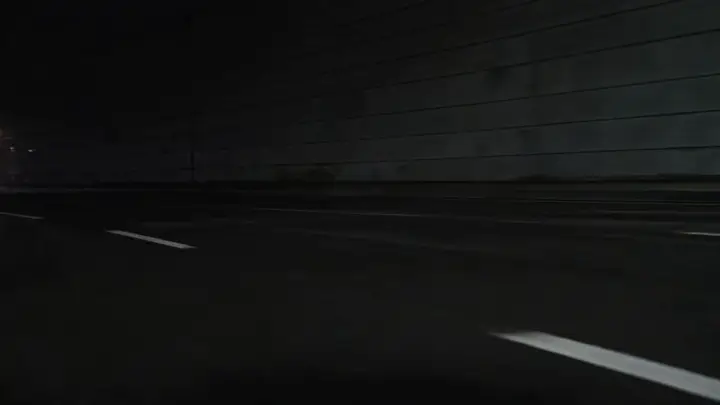 A red sports coupe exploding out of a tunnel into reflective city light with a premium commercial finish.