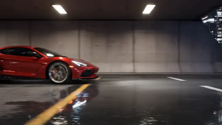 A red sports car emerging from a dark tunnel into city lights at night.