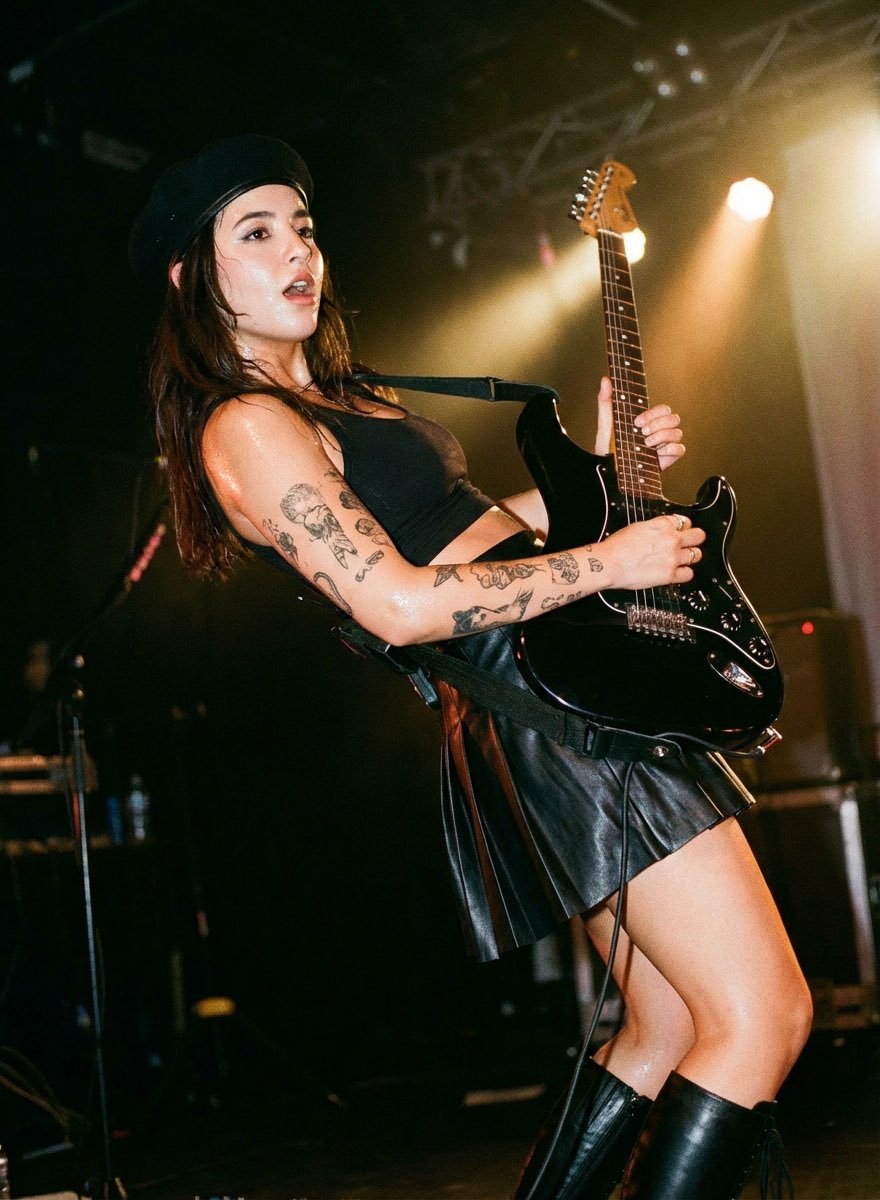 Ultra-Realistic Cinematic Concert Photo of Female Electric Guitarist